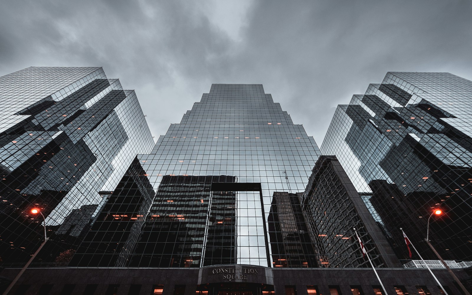 Modern glass office towers viewed from below